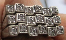 xxM1335M 14k Diamond ring composed of three equal rings Takst-Valuation N. Kr. 45 000